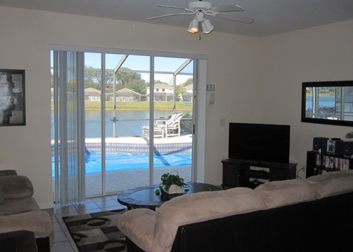 Livingroom towards the Lake and Pool